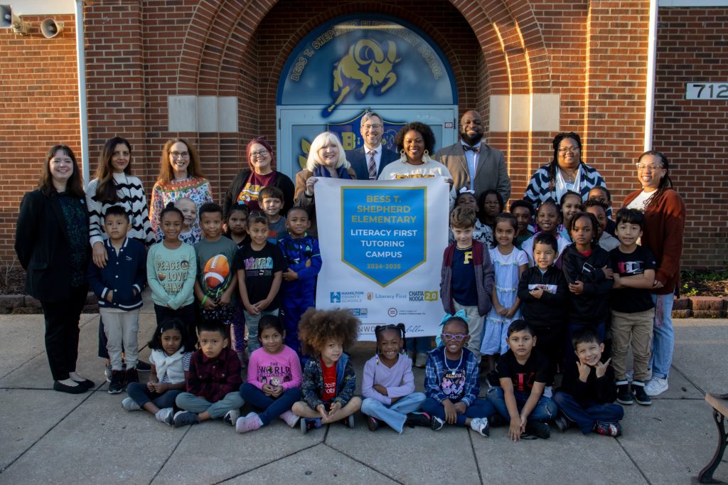 A group poses for a photo