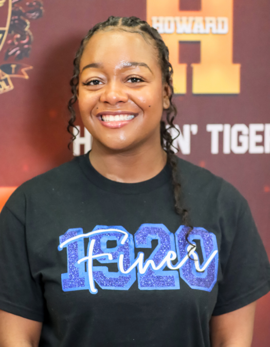 A woman poses for a photo