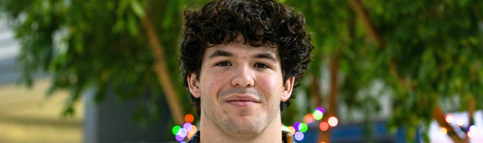 A student poses for a photo