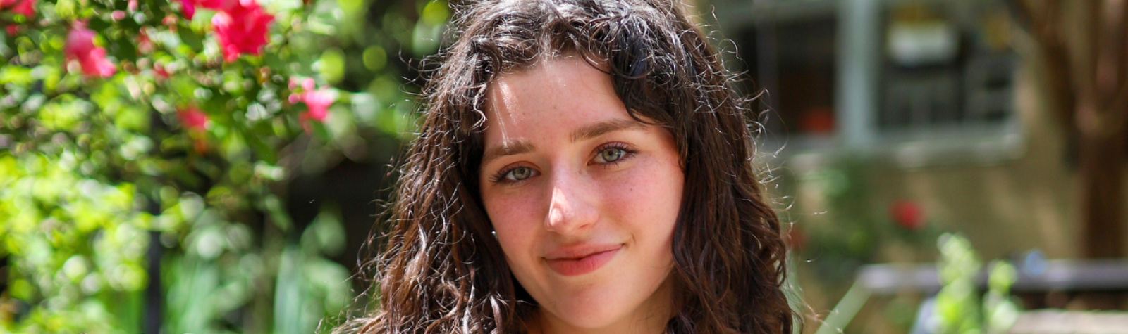 A student poses for a photo