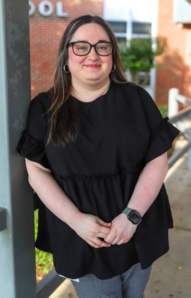 NEWSROOM COVER - Storybook Trail-8 A teacher poses for a photo