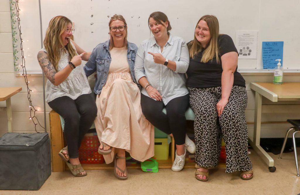 Teacher Appreciation Week_ Anna BehrendsTeacher Appreciation Week_ Anna Behrends-2 Teachers pose for a photo