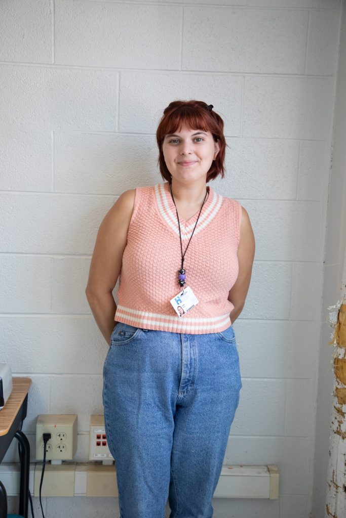 0D5A2042-2 teacher smiling in classroom