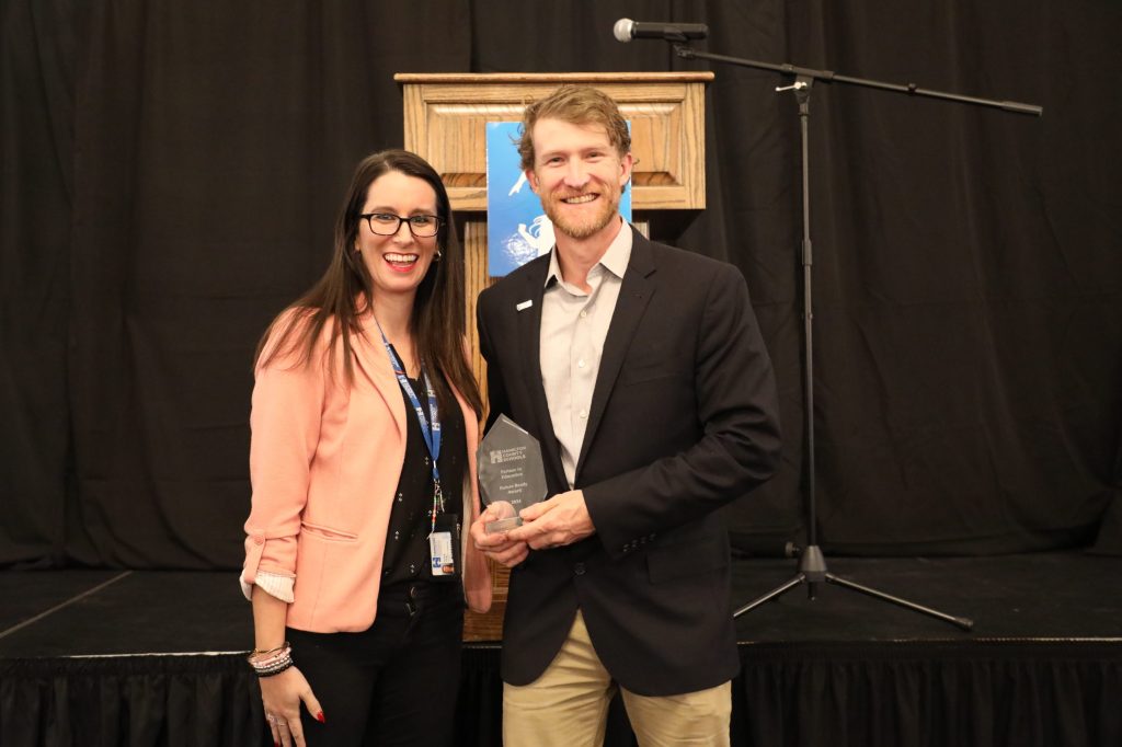 A group poses for a photo