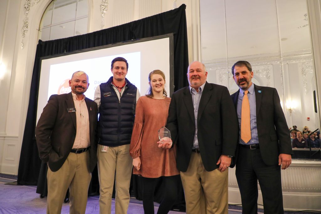 A group poses for a photo