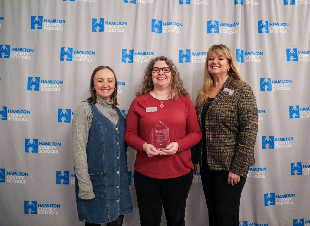 A group poses for a photo