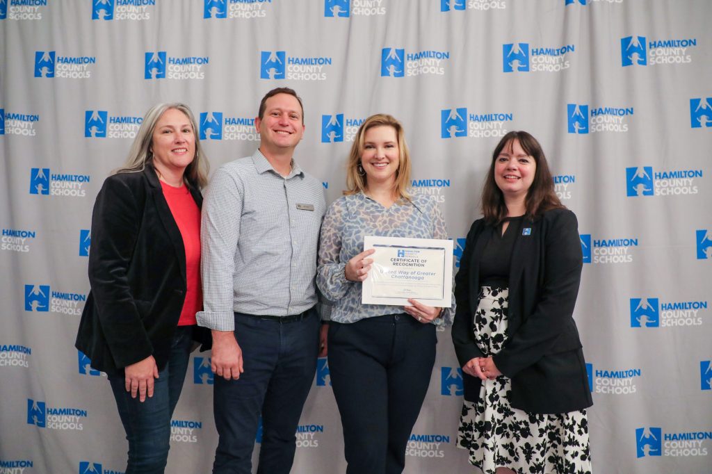 A group poses for a photo
