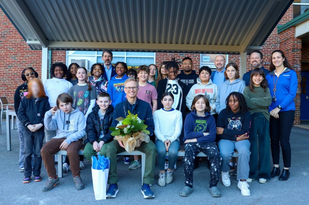 1 A group poses for a photo