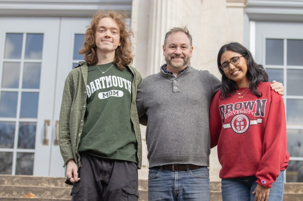 CSAS Ruby Questbridge-17 Students pose for a photo with a teacher