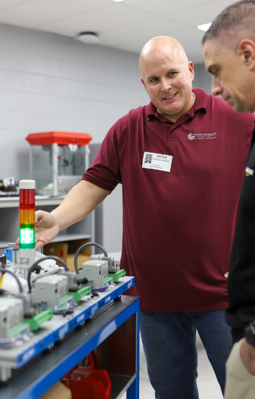 Central FRI-2 A man talks by equipment