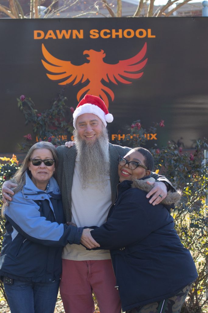 Dawn School Edit-1 A group poses for a photo