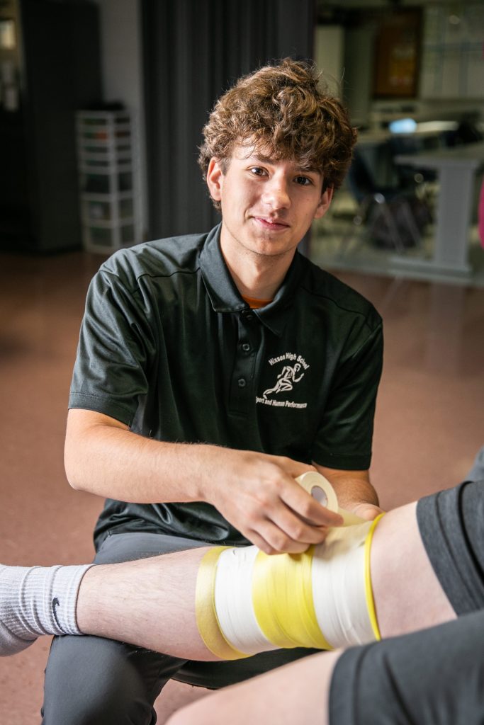 Erlanger Partnership-2 students practice wrapping leg