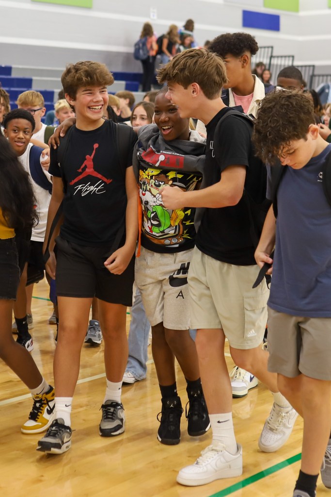 FirstDayEdited-17_f3a03c kids laughing and walking in gym