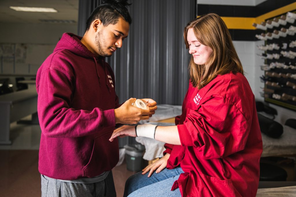 HixsonHigh_38 students practice wrapping arm