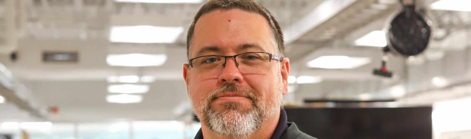 Principal Jim David in STEAM School classroom header