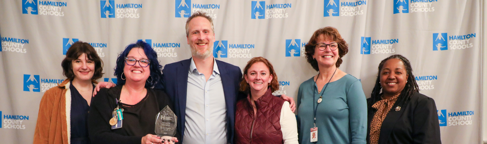 A group poses for a photo