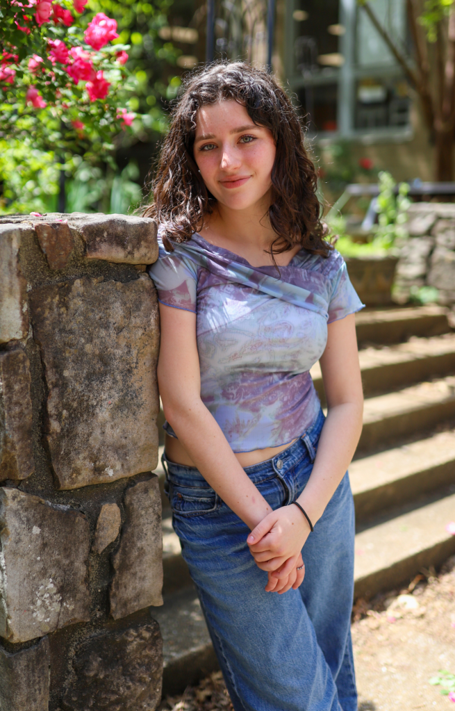 NEWSROOM COVER - Storybook Trail-21 A student poses for a photo