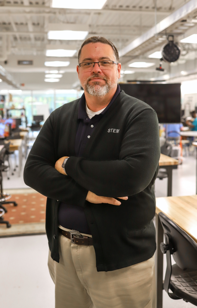 NEWSROOM COVER - Storybook Trail-5-4 Principal Jim David in STEAM School classroom