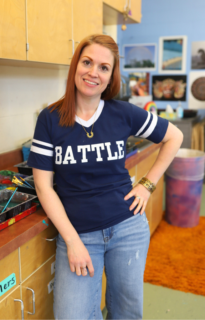 NEWSROOM COVER - Storybook Trail-6 An art teacher poses for a photo