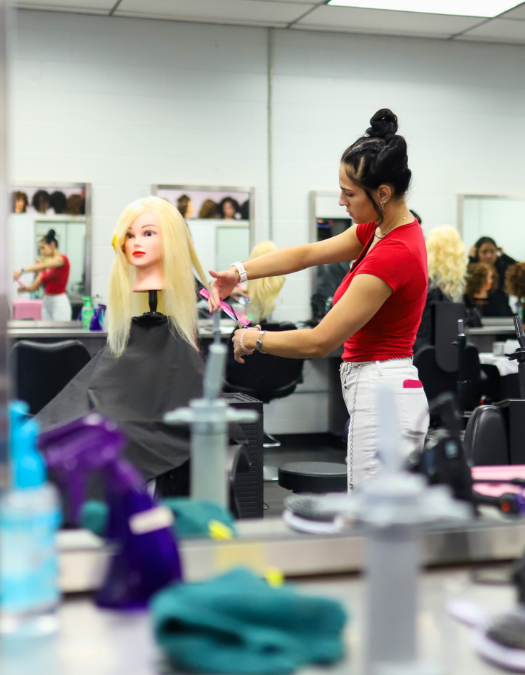 A cosmotology student works