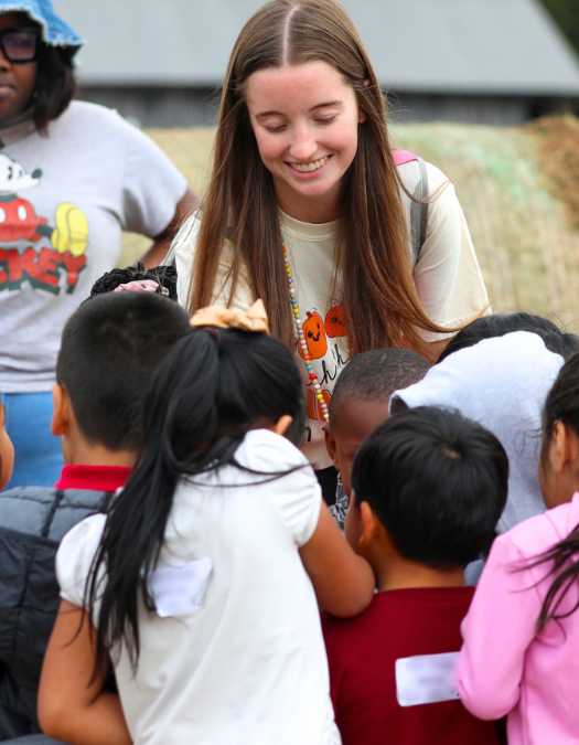 New Featured Image - Leanne Weiler A teacher talks to students