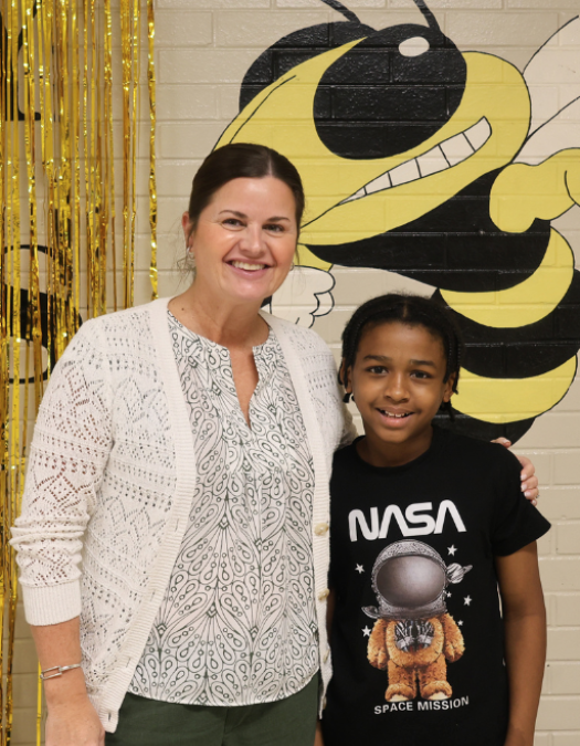 Lookout Valley Middle High Principal McBryer with student