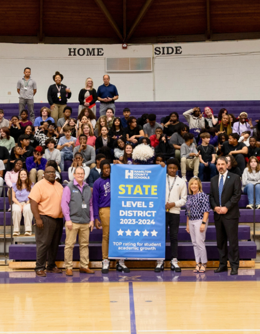 New Featured Image - Lvl 5 Brown Middle Students pose for a banner presentation photo