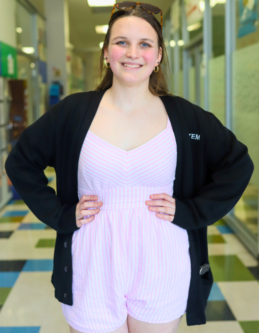 A student poses for a photo