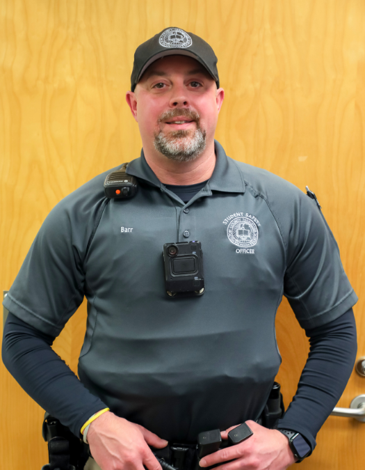 An SSO poses for a photo