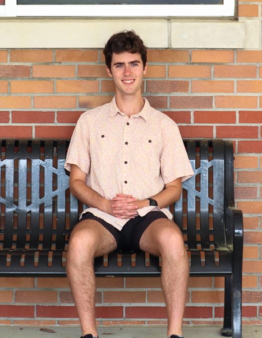 A student poses for a photo
