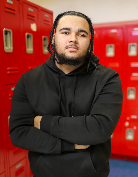 A student poses for a photo