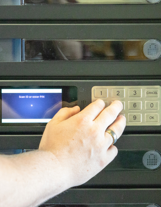 man punching numbers on tech towers at Hunter Middle