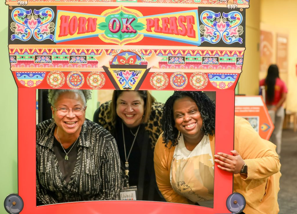 New _ Teacher Mentor Program-20 Three people smile for a photo