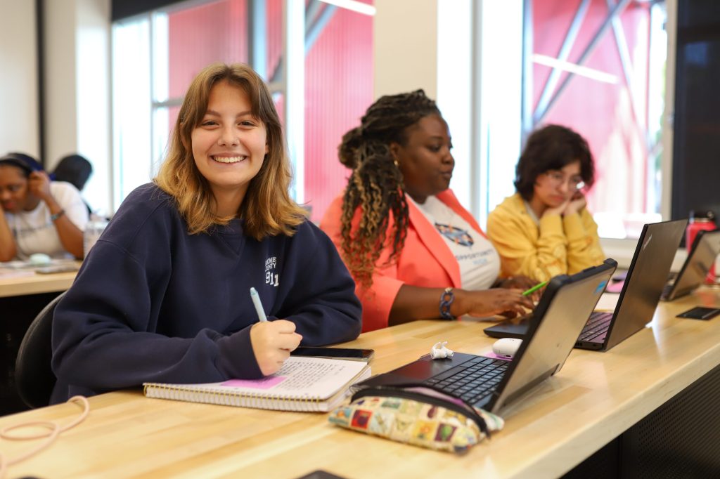 OP.HIGH-21 A girl smiles for a photo