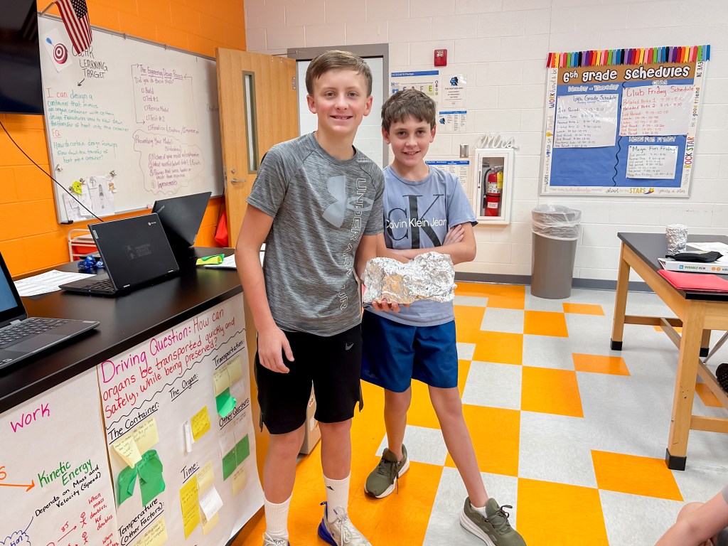 Organ Donor Project Sale Creek-2 Middle School kids showing science project