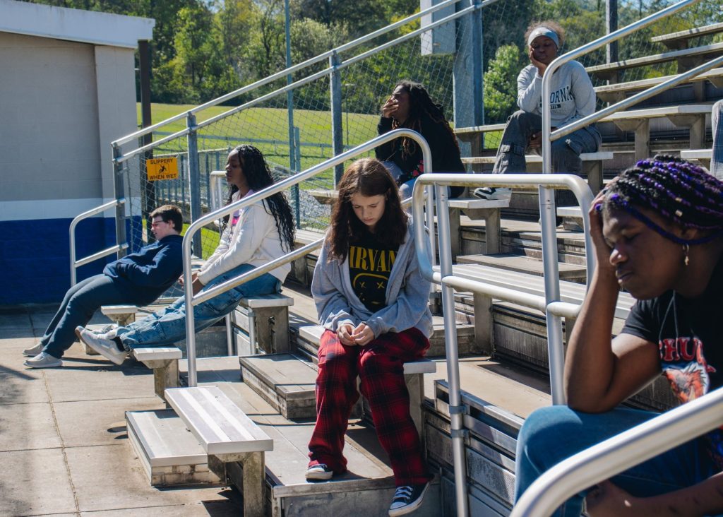 RBH Mental Health Week-23 students with eyes closed on bleachers at red bank high