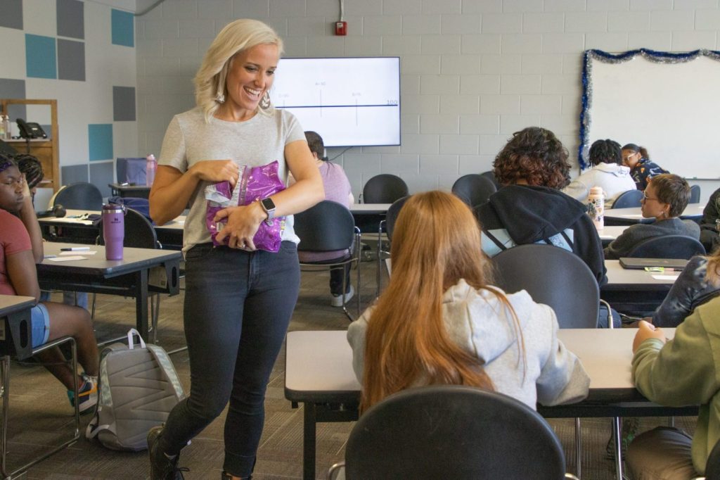 RBH Mental Health Week-4 teacher/social worker / counselor hands out candy in classroom