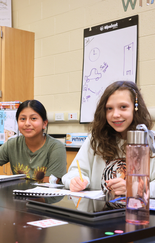 RBM Two students in a classroom