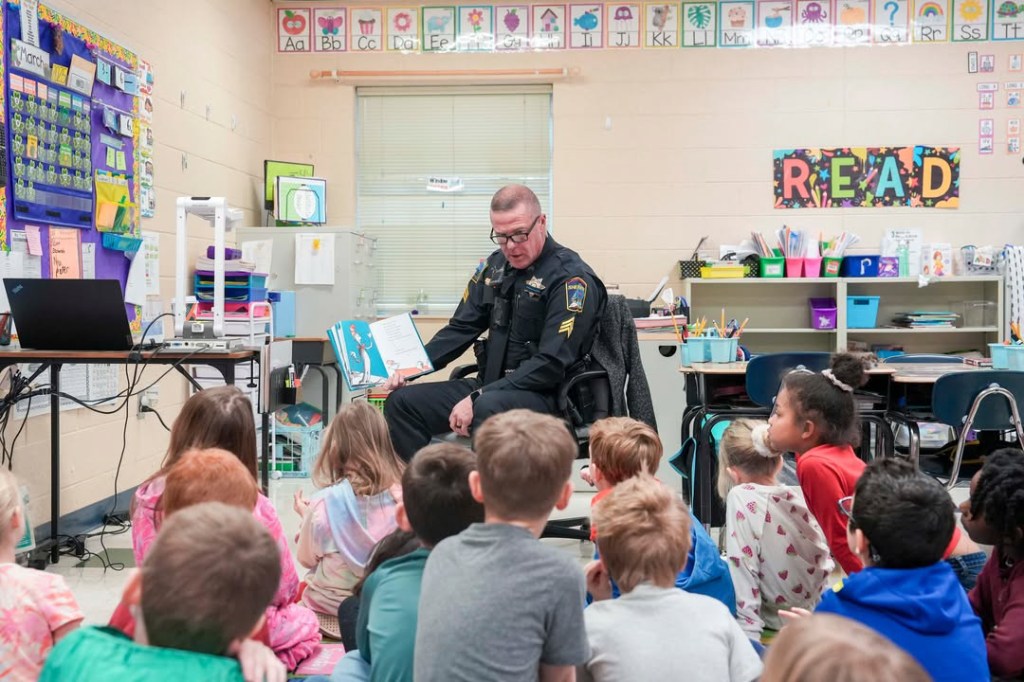 Read Across America Edited-1 An officer reads to a class