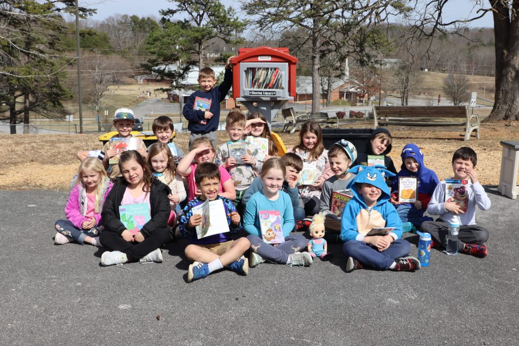 Read Across America Edited-6 Students pose with books