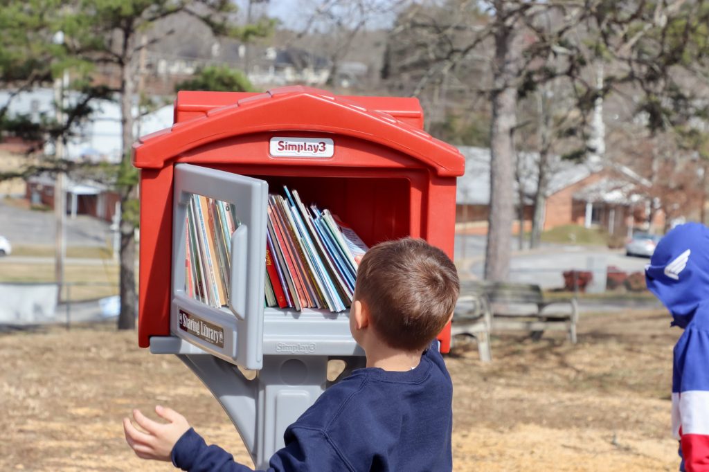 Read Across America Edited-8 A student reaches for a book