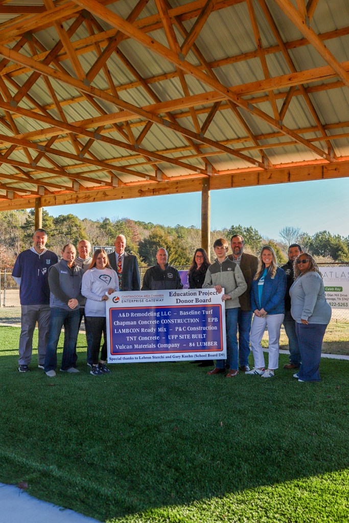 HMS Unveils New Batting Cage A group poses for a photo