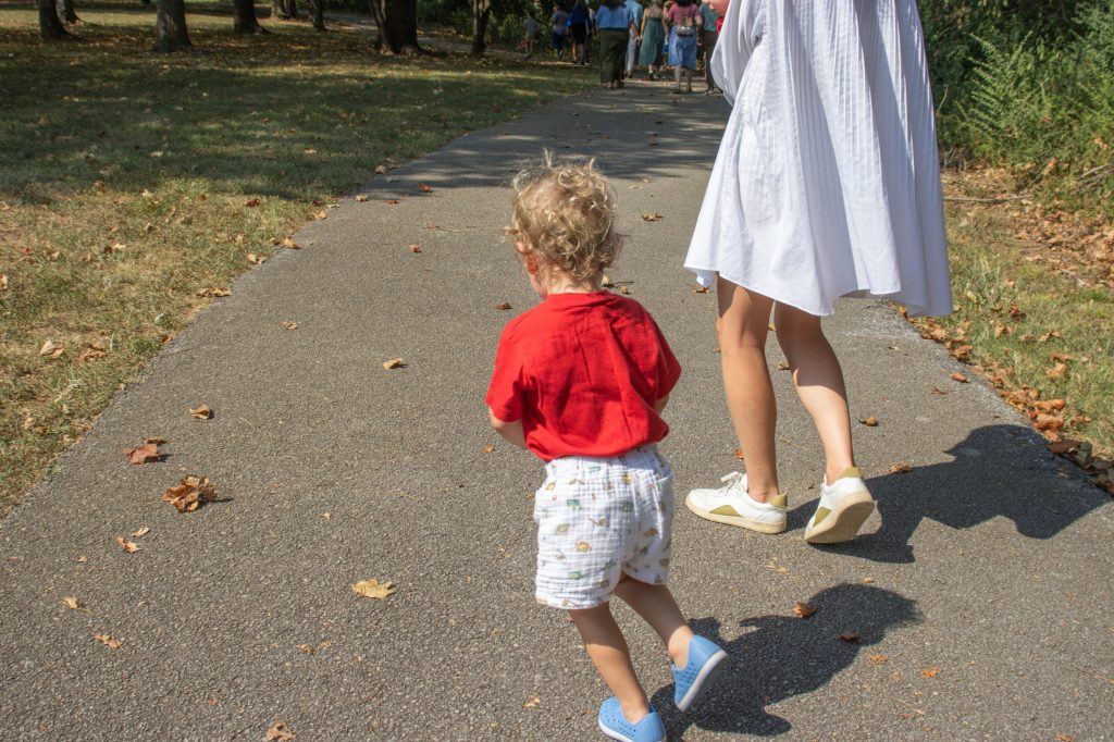 Storybook Trail 8.29.24-13 A group walks outside