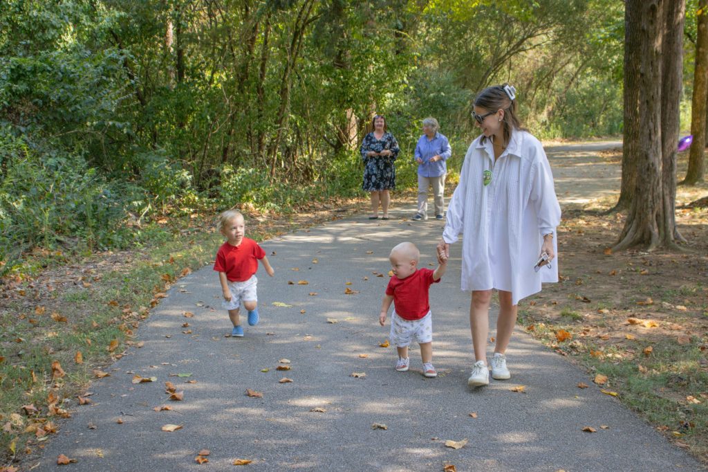 Storybook Trail 8.29.24-17 A group walks outside