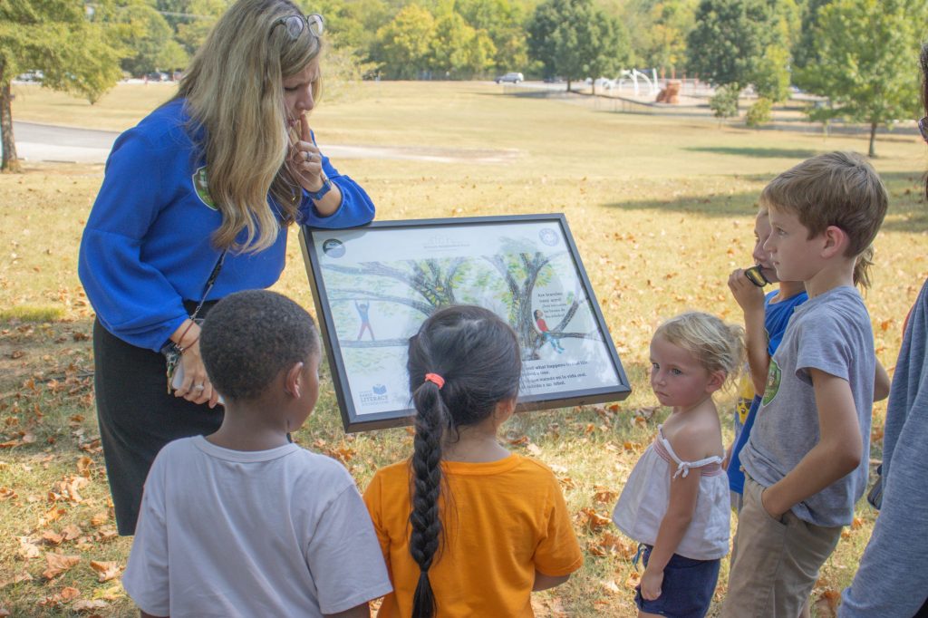 Storybook Trail 8.29.24-23 A group walks outside