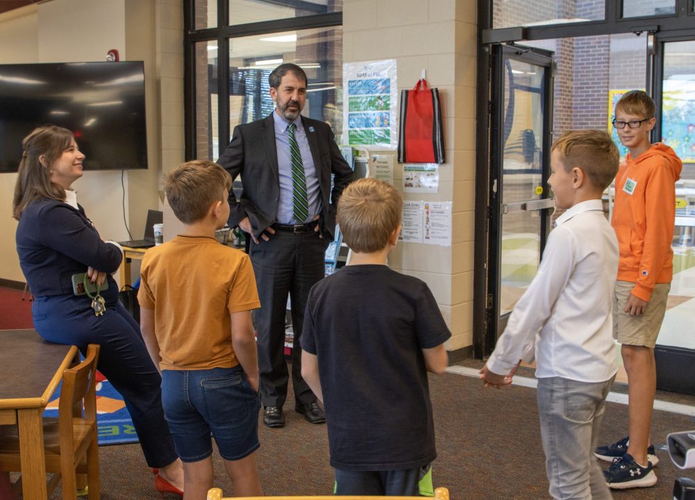 Ukraine Delegate Visits EBE-2 kids talk with dr Robertson during East Brainerd Elementary Ukraine Mayor Visit