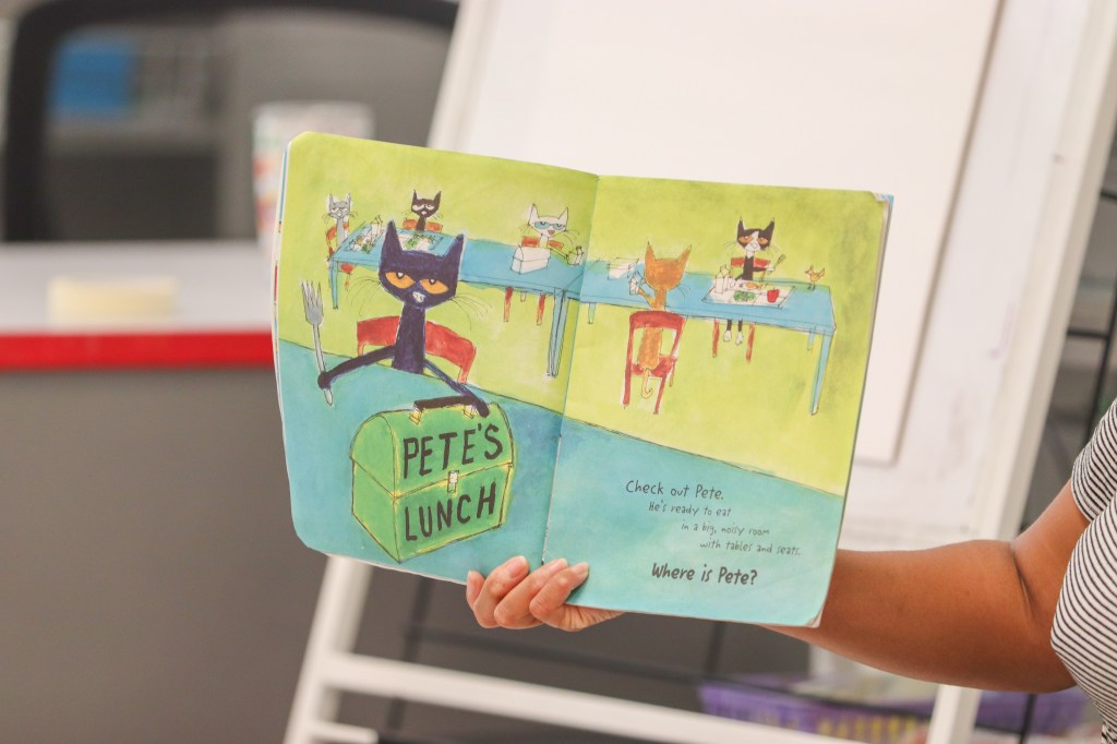 Book Bus Summer Reach MVE-1 teacher reading to students