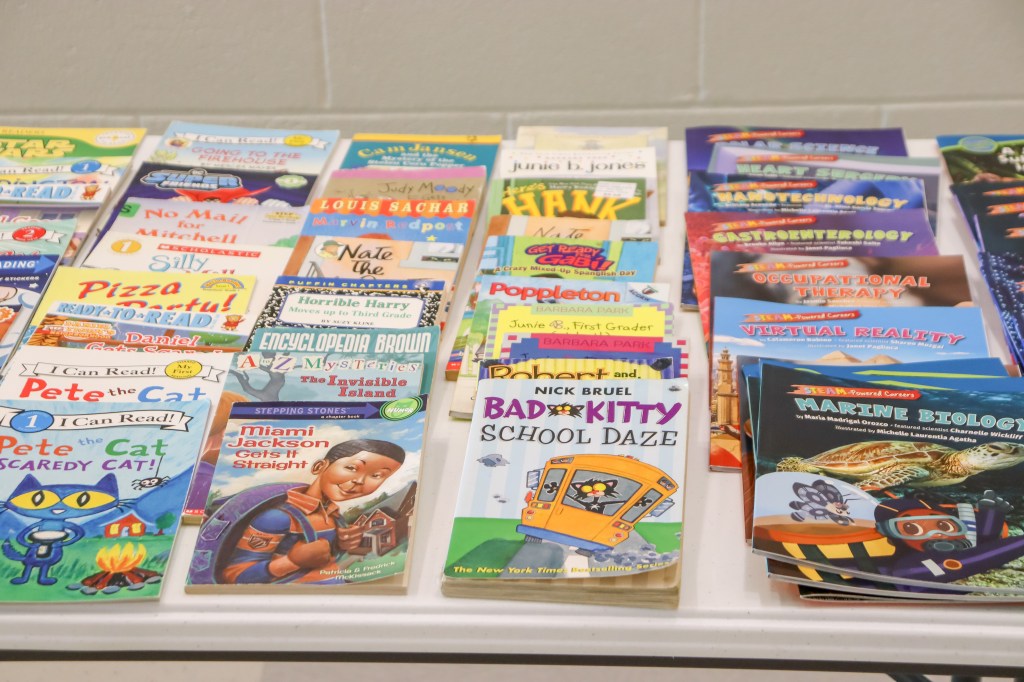 Book Bus Summer Reach MVE-14 books on table