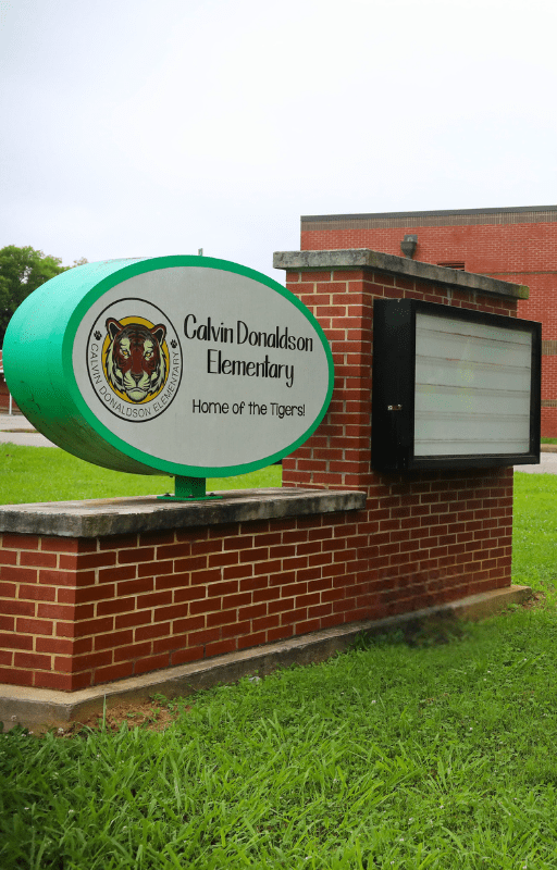 school name sign entrance Calvin Donaldson Elementary