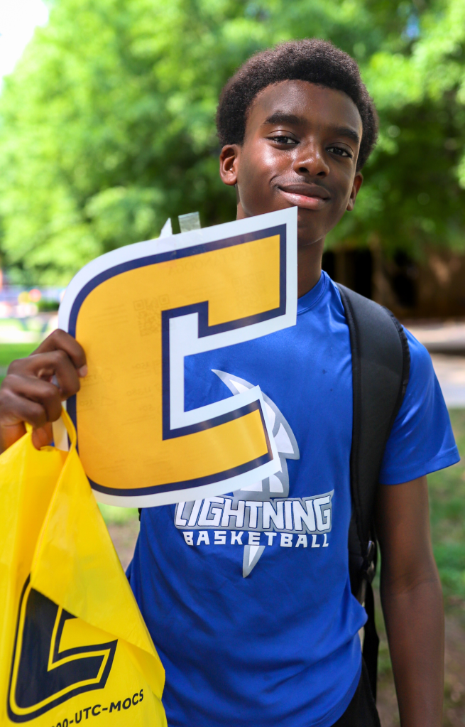 NEWSROOM COVER - Storybook Trail-23 student posing for picture and smiling outside
